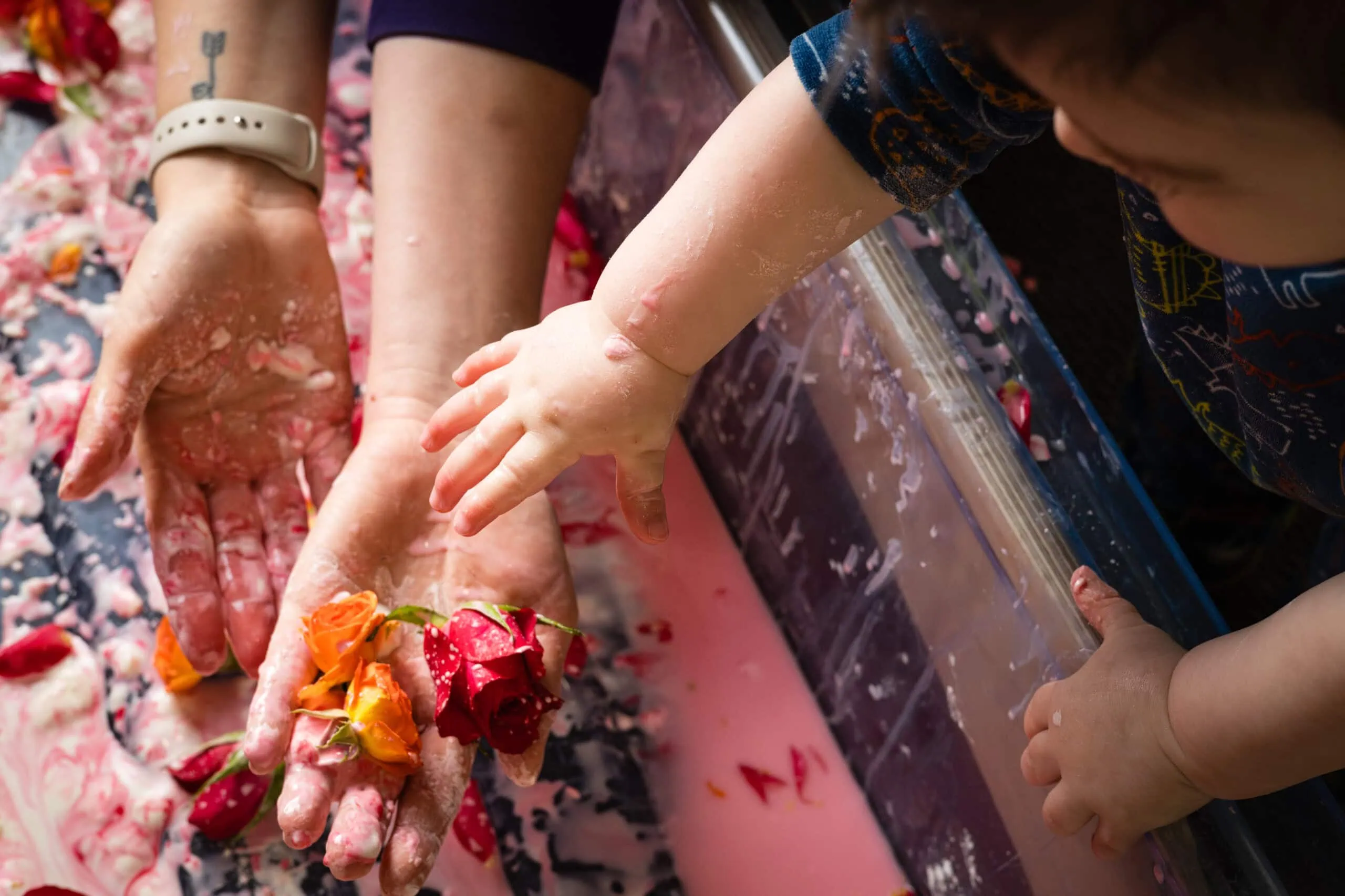Practitioners working with children at Shelford Day Nursery
