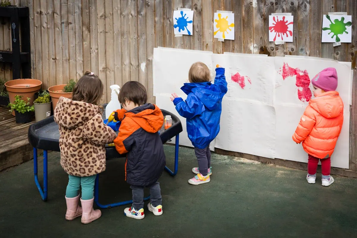 Practitioner supporting a child's learning at Shelford